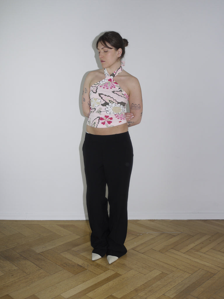 Pink floral halter top with open back and ruched sides – Y2K-inspired, reminiscent of early 2000s Diesel and Blumarine aesthetics.