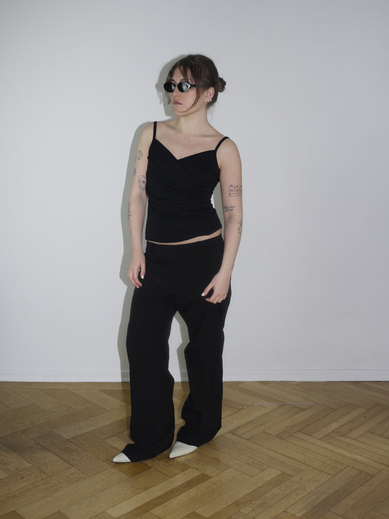 Vintage-inspired black ruched spaghetti strap top, fitted silhouette, size 38 – reminiscent of Y2K runway pieces