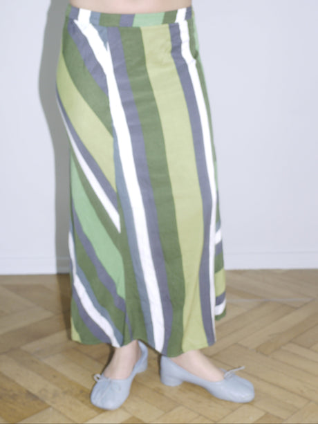 Vintage midi skirt in green, navy, and cream abstract stripes — flowy silhouette with elastic waistband, perfect for spring. Inspired by Paloma Wool and Dries Van Noten aesthetics.