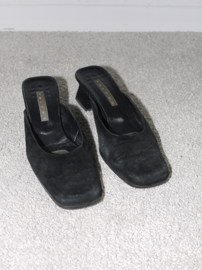 Vintage black suede slingback heels with square toe and low block heel, featuring a subtle logo detail on the insole from the brand Paloma.