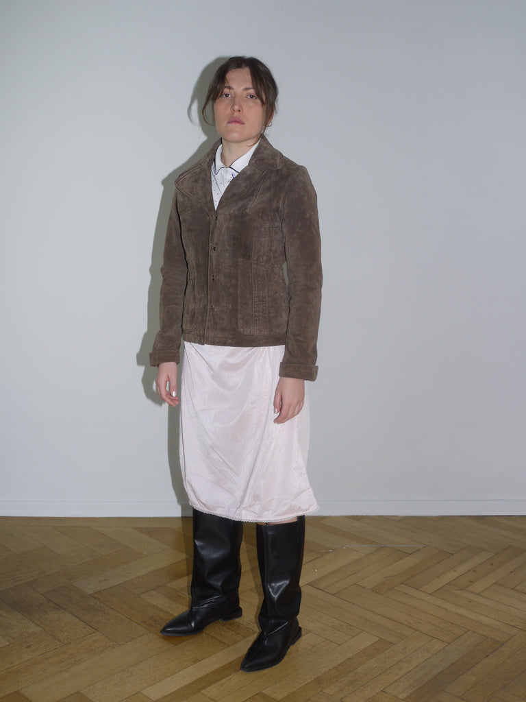 Feminine and cool outfit with brown cropped faux fur jacket and vintage white dress – inspired by Miu Miu’s offbeat elegance.